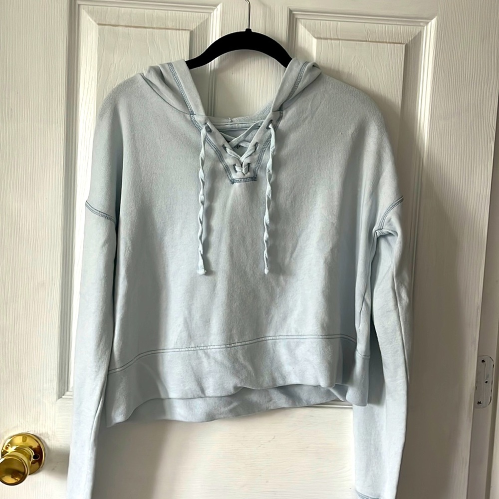 Pastel blue cropped hoodie.